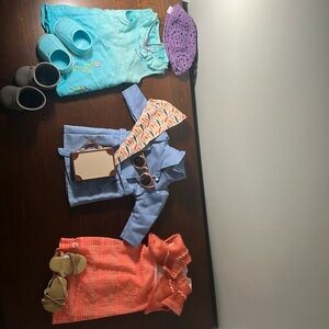 Set of three 18 in doll outfits